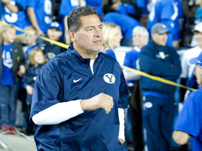 Robert Anae prior to a game as BYU's offensive coordinator in 2014. Anae is reportedly set to become NC State's next offensive coordinator after the departure of Tim Beck.